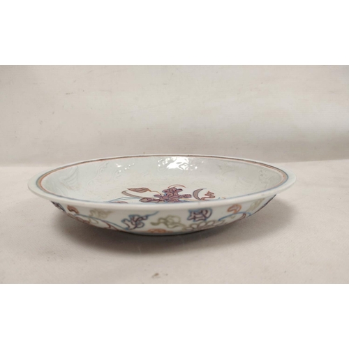 148 - Pair of Chinese Yuan style white glazed dishes with moulded phoenix decoration and applied enamels, ... 