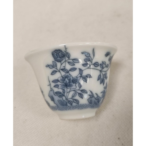 154 - Pair of delicate Chinese porcelain blue and white 'month' cups, 4.5cm.