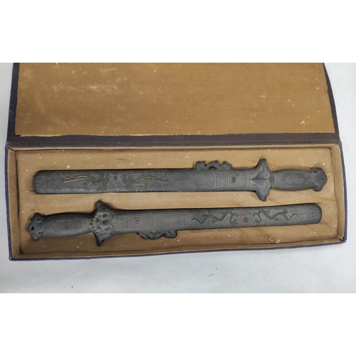 158 - Rare Chinese ink blocks in the form of a pair of swords, fitted box. Late Qing, early 20th century. ... 