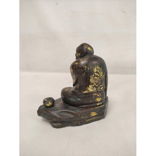 160 - 19th century Chinese bronze figure of a seated mendicant with alms bowl, traces of gilding, 18cm hig... 