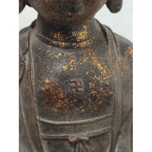 162 - Chinese bronze statue of the seated Buddha, traces of gilding, Qianling mark, 28cm high.