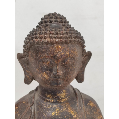 162 - Chinese bronze statue of the seated Buddha, traces of gilding, Qianling mark, 28cm high.