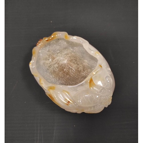 190 - Chinese agate brush washer in the form of a crenulated shell with goldfish to the side, 10.5cm long.