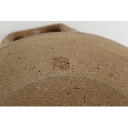 321 - 1970's studio pottery deep bowl of circular footed form with lip and tenmoku glaze, incised mark J.T... 