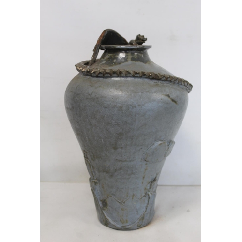 323 - Large studio pottery vase of baluster form, the shoulders surmounted by a dragon with long curling t... 