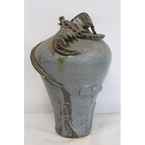 323 - Large studio pottery vase of baluster form, the shoulders surmounted by a dragon with long curling t... 