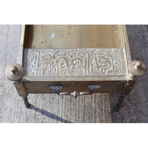 347 - Islamic Cairoware brass trough of rectangular twin handled form with two fixed handles and four turn... 