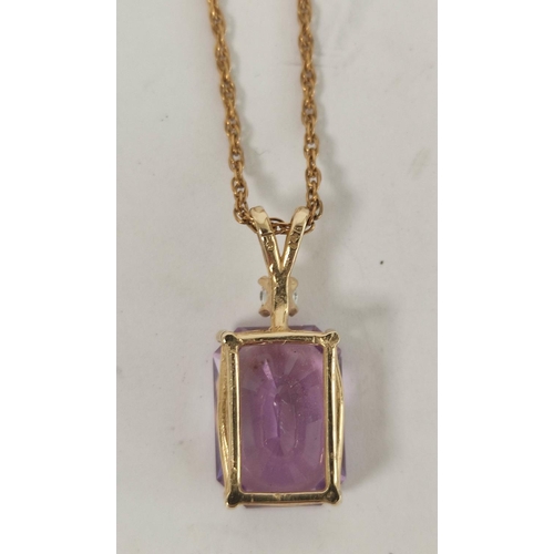 105 - Gold pendant with rectangular amethyst and diamond, probably '14'.