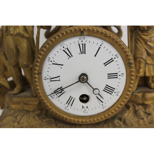 114 - French spelter mantle timepiece with two figures on giltwood base. 32cm.