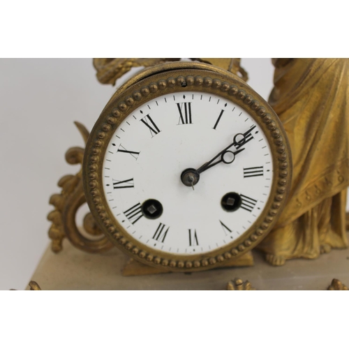 115 - French spelter mantel clock with figure representing Industry. 32cm.