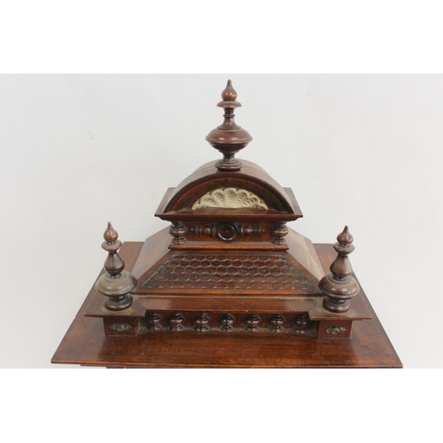 116 - Junghams mantel clock with silvered and ivory dial, in walnut and rosewood case with turned columns.... 