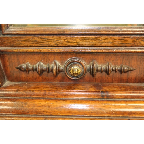 116 - Junghams mantel clock with silvered and ivory dial, in walnut and rosewood case with turned columns.... 