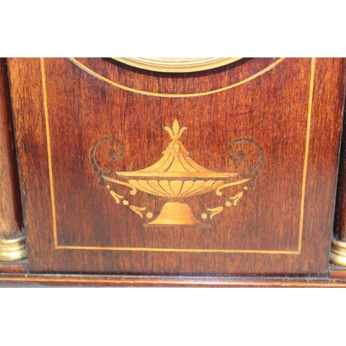 118 - Edwardian period mantle clock in inlaid rosewood case with break arch. 32cm. 