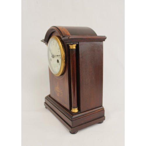 118 - Edwardian period mantle clock in inlaid rosewood case with break arch. 32cm. 