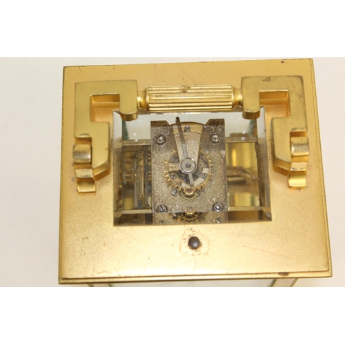 120 - French carriage clock, quarter repeating, with silvered platform and compensated balance, in gilt ca... 