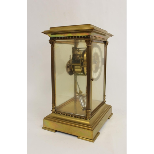 126 - French mantel clock of 'four glass' style with visible escapement, 'mercury' pendulum and fluted col... 