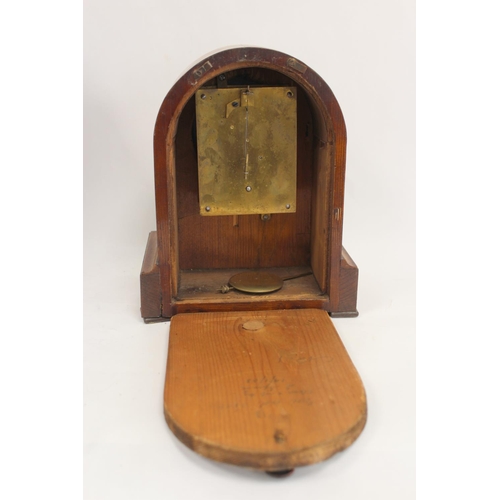 131 - Junghans mantel clock in stained beech case, 43cm and a timepiece in arched case, 1906, 24cm. (2).