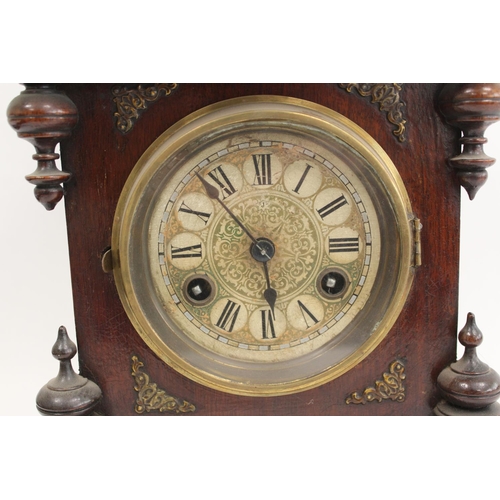 131 - Junghans mantel clock in stained beech case, 43cm and a timepiece in arched case, 1906, 24cm. (2).