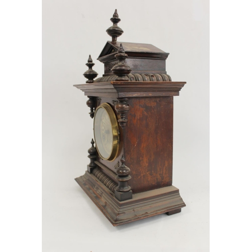 131 - Junghans mantel clock in stained beech case, 43cm and a timepiece in arched case, 1906, 24cm. (2).