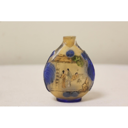 176 - Two antique Chinese inside painted glass snuff bottles, to include one of elongated form with mounta... 