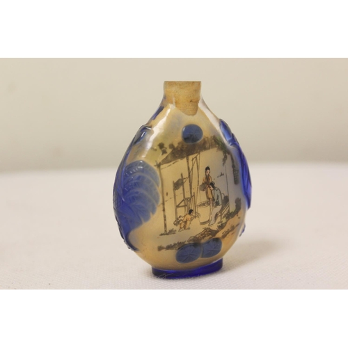 176 - Two antique Chinese inside painted glass snuff bottles, to include one of elongated form with mounta... 