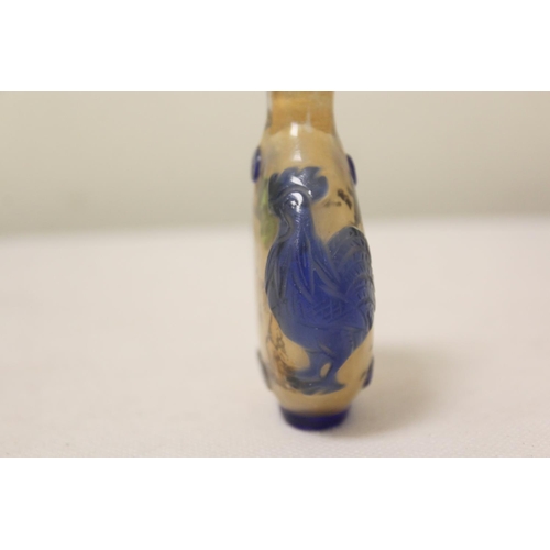 176 - Two antique Chinese inside painted glass snuff bottles, to include one of elongated form with mounta... 