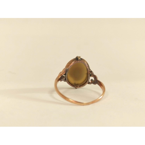 64 - Onyx cameo ring in 9ct gold, indistinct Chester assay c1930. Size 'R'.