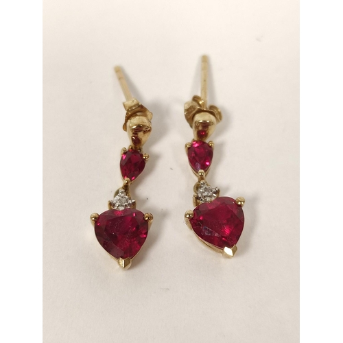 68 - Pair of synthetic ruby and diamond drop earrings.