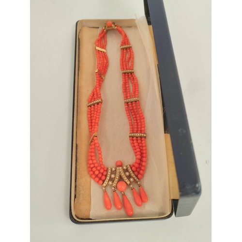 69 - Victorian collar with four rows of coral beads, with pearl and enamelled gold ties and a similar cen... 