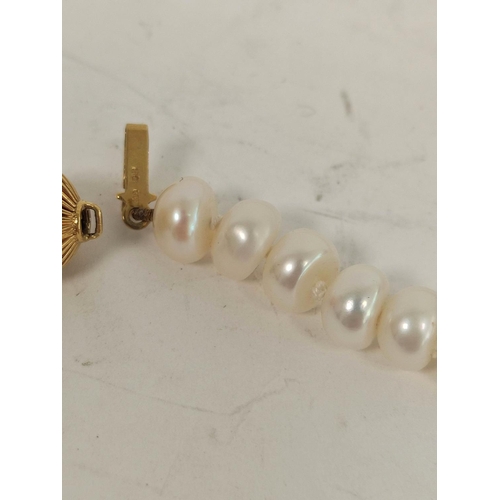 72 - Baroque pearl bead necklace on 9ct gold ribbed ball snap.