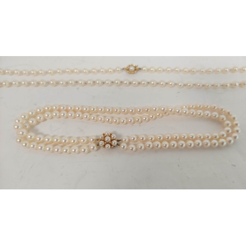 73 - Cultured pearl necklace, opera length adaptable to form a two row on 9ct gold pearl cluster snap.