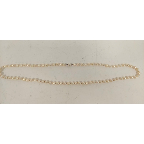 75 - Cultured pearl necklace, equal sized, on silver hook snap.