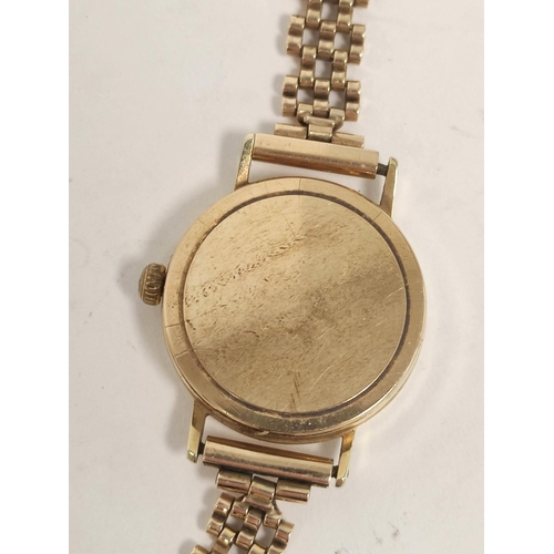 83 - Lady's Tissot 9ct gold bracelet watch, 15.9g gross.