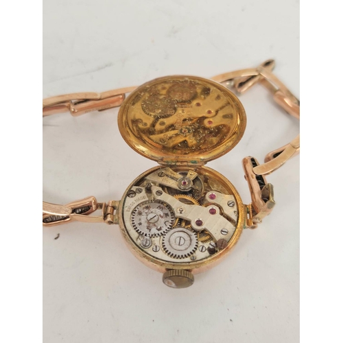 85 - Two lady's 9ct gold watches on expanding bracelets, 35g gross.