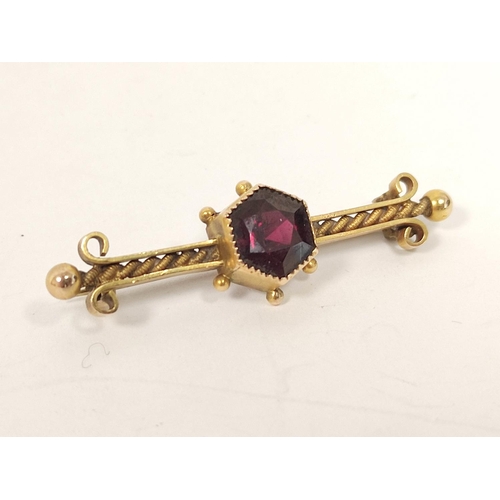 91 - Garnet set bar brooch and four others.