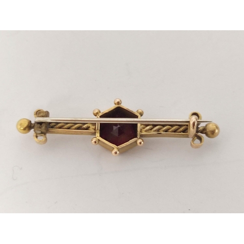 91 - Garnet set bar brooch and four others.