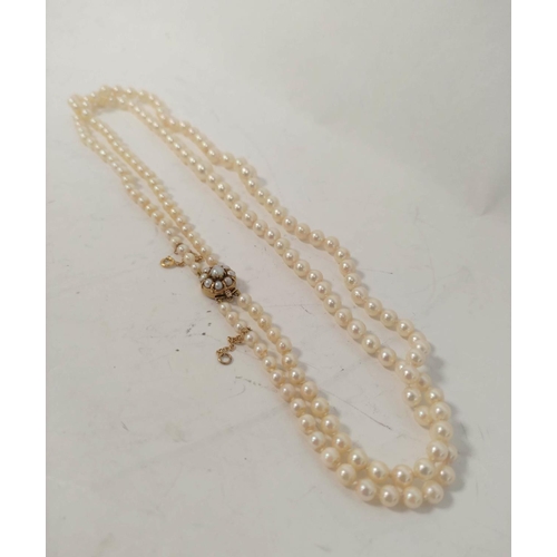 98 - Two row necklace of cultured pearls on similar 9ct gold snap.