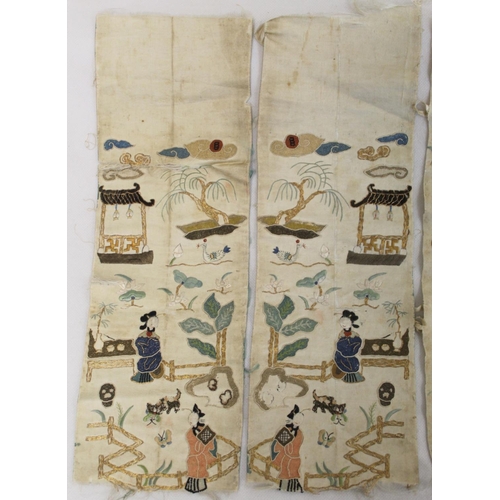 458 - Two pairs of Chinese silk embroidered sleeve panels depicting figures in gardens with pavilions, wor... 