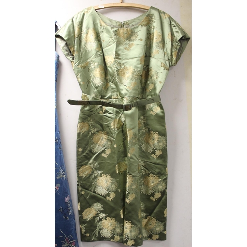 465 - Two vintage Chinese silk brocade dresses, one sage green woven with chrysanthemum of belted waisted ... 