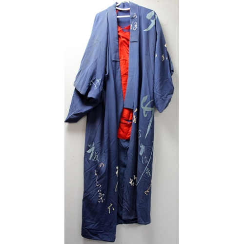 466 - Japanese black silk kimono jacket with woven floral and foliate decoration and a blue kimono decorat... 