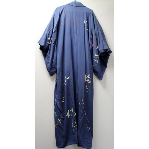 466 - Japanese black silk kimono jacket with woven floral and foliate decoration and a blue kimono decorat... 