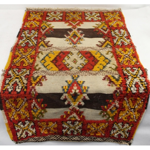 473 - Three Eastern woven floor mats, 120cm x 68cm, 110cm x 43cm and 52cm x 54cm.  (3).