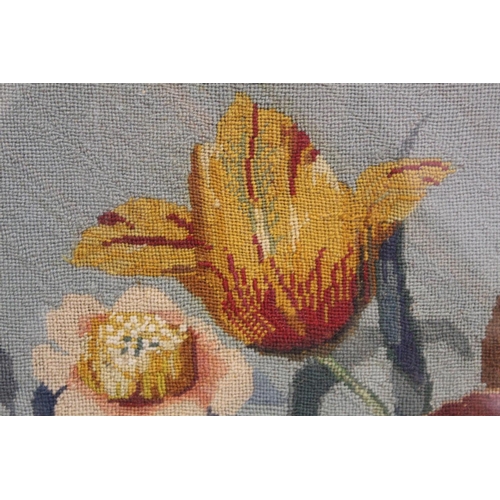 487 - Victorian wool work tapestry picture of a vase of flowers, worked in polychrome, 60cm x 51cm, in ros... 