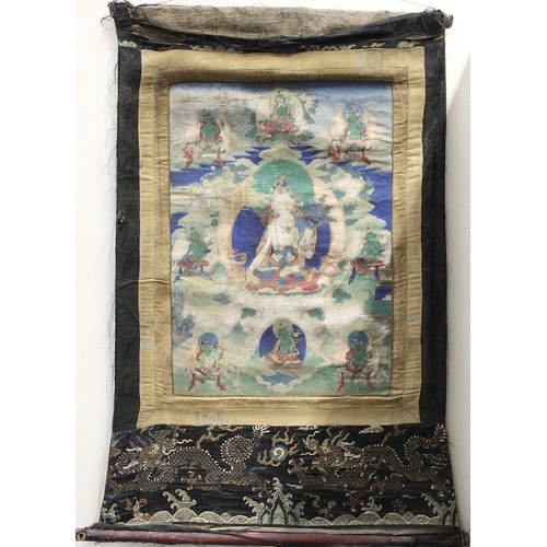 200 - Antique Tibetan Buddhist Thangka depicting Guanyin seated on a lotus throne surrounded by eight smal... 