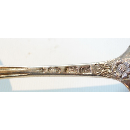 47 - Pair of embossed silver berry tablespoons, 1746, another two, 1781, and another, Exeter.