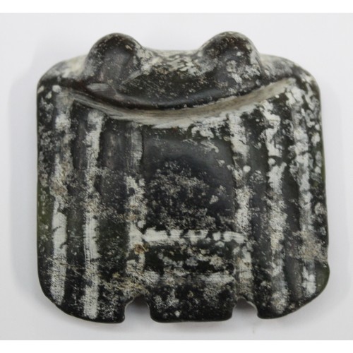 181 - Three Chinese archaic and archaised jade carvings to include a belt hook with dragon head carving, a... 