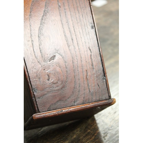 205 - Georgian elm hanging candle box of tapered rectangular form with arched pierced box, sloping hinged ... 