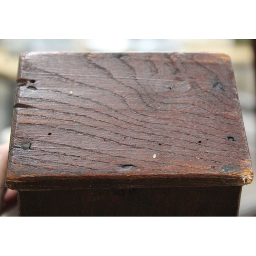 205 - Georgian elm hanging candle box of tapered rectangular form with arched pierced box, sloping hinged ... 