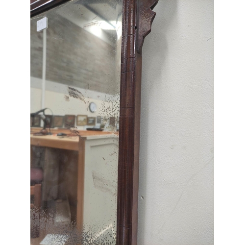 619 - Georgian mahogany fret frame wall mirror, shaped top, bevelled plate and moulded frame. 105cm