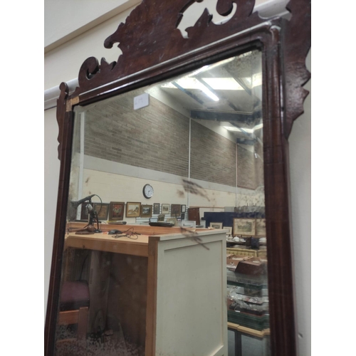 619 - Georgian mahogany fret frame wall mirror, shaped top, bevelled plate and moulded frame. 105cm